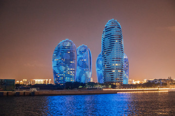 night view of Phoenix island from the sea city Sanya Hainan island