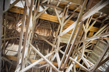 Wooden beams, attic, wooden roof of an old building.