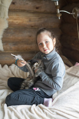Obraz premium little girl and kitten