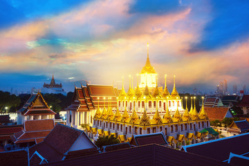 Wat Ratchanaddaram Temple in Bangkok Thailand in morning sunrise beautiful blue sunlight sky