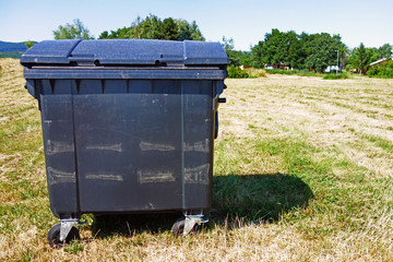 Plastic container for rubbish in nature