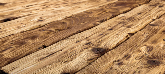 Texture of old natural wooden boards. Background of a wooden surface