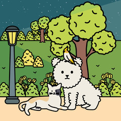 Obraz na płótnie Canvas cute cat and dog with bird in the park