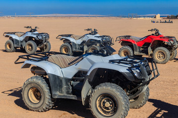 Fototapeta na wymiar ATV quad bikes for safari trips in Arabian desert, Egypt