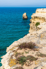 Fototapeta na wymiar Dreamlike Salento. Bay of Torre dell'Orso and stacks of the two sisters. Puglia, Italy
