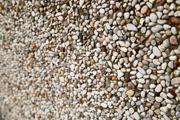 Stone asphalt texture of road. Grey asphalt road and gravel. Background pebble and gravel