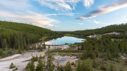 Nymph Lake, Yellowstone National Park. Tranquil lake in the middle of the forest, surrounded by hot springs and geysers.