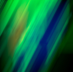 Bright colored blured brushstrokes as multicolored flashes for an abstract background. Toned