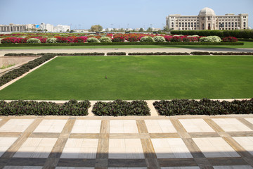 Muscat,capitol of Oman,with garden and government buildings