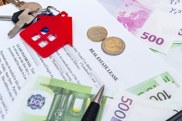 House, home, property, real estate lease rental contract agreement pen money coins keys wooden background, expenses, buying, investment, finance, savings, concept close up selective focus