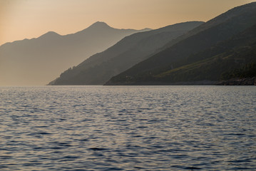 Beautiful sunset with rocks in the Adriatic sea, Dingac Borak, Dalmatia, Croatia, Peljesac peninsula