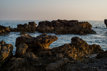 Beautiful sunset with rocks in the Adriatic sea, Dingac Borak, Dalmatia, Croatia, Peljesac peninsula