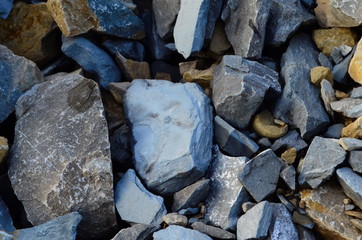 large and small stones on the river bank