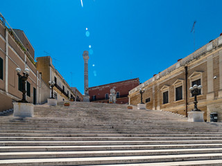 Obraz premium Steps of the Roman columns at the harbor promenade, Brindisi, Apulia, Italy June 2019