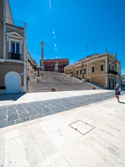 Steps of the Roman columns at the harbor promenade, Brindisi, Apulia, Italy June 2019 - obrazy, fototapety, plakaty