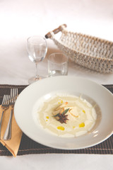 Smashed Potatoes in white plate and star anice