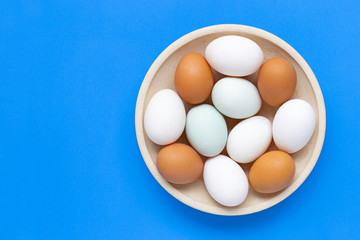 Eggs on blue background.