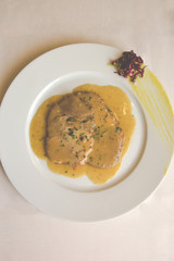 Tasty beef in mushrooms sauce