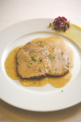 Tasty beef in mushrooms sauce