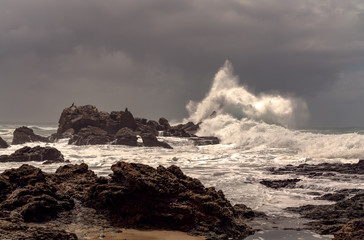 waves crashing near the rocks 