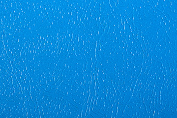 Blue textured leather background. Abstract leather texture.