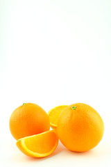 fresh orange fruits isolated on a white background with copy space