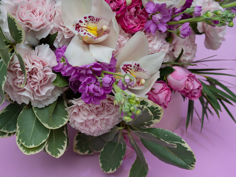Wedding bouquet of orchids,matiolli, carnations, beautiful delicate flowers.