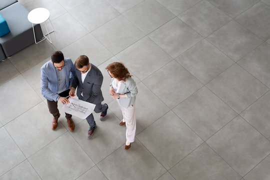 Business people planning strategy in office together