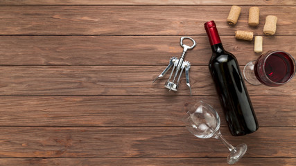 Wine bottle on wooden background