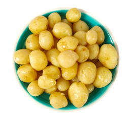 boiled new potatoes isolated on white