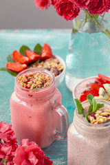 smoothie with granola for healthy breakfast. Selective focus