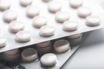 Packs of pills isolated on white background