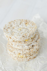 Close-up of puffed rice cakes on parchment paper