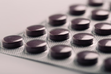 Packs of pills isolated on white background