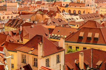 Red tiled roofs of Prague. Ancient architecture of Europe. City landscape.