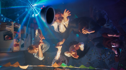 At the College Party: Diverse Group of Friends Have Fun, Dance, Socialize and Drink. Stylish Young...