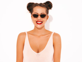Closeup portrait.Young beautiful sexy smiling hipster woman with red lips in sunglasses.Trendy girl in summer swimwear bathing suit. Positive female going crazy.Funny model isolated on white.Two horns