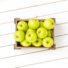 Fresh apples in wooden crate. Close up