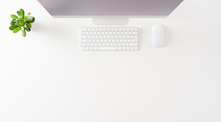 Office desktop with computer and copyspace. Top view