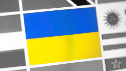Ukraine national flag of country. Ukraine flag on the display, a digital moire effect.