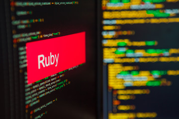Programming language, Ruby inscription on the background of computer code.