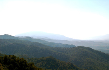 layered mountains, foggy weather