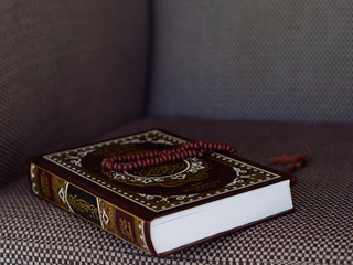 Islamic concept - Closed the holy Quran with rosary. Prayer at Hijri New Year 2019