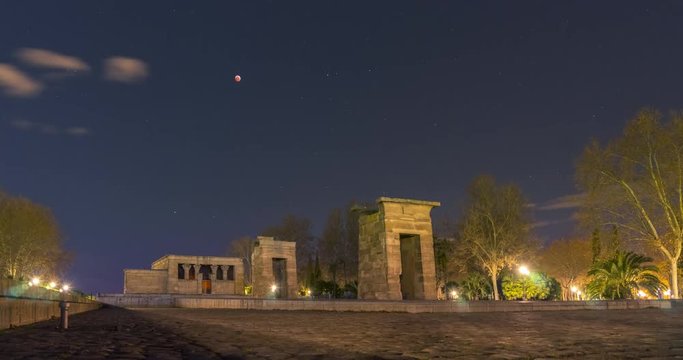 Timelapse of moonset during moon eclipse. Templo de Debod as main subject. Madrid, Spain.