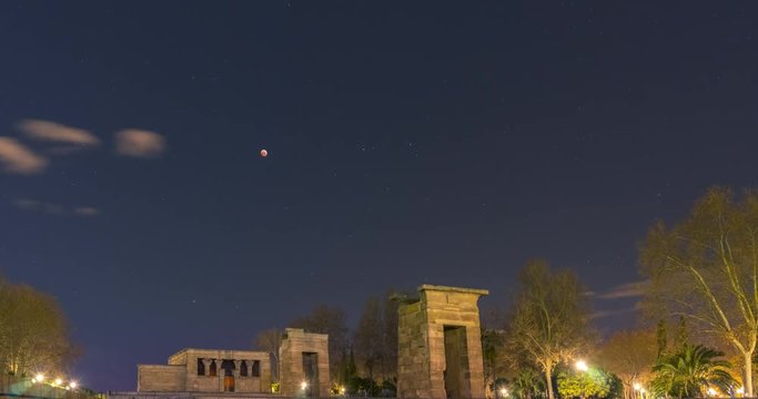 Timelapse of moonset during moon eclipse. Templo de Debod as main subject. Madrid, Spain.