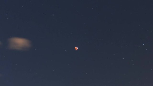 Timelapse of moonset during moon eclipse. Templo de Debod as main subject. Madrid, Spain.