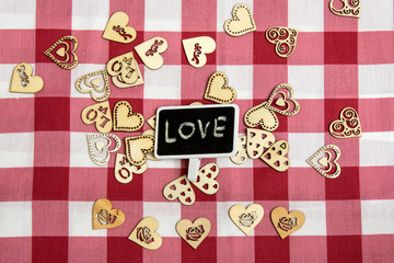 Tablecloth in a red checked wooden heart