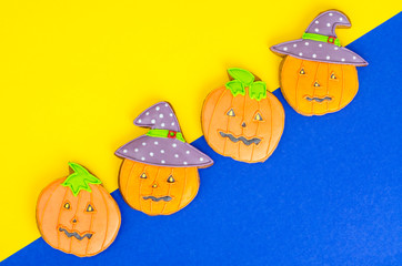 Bright Halloween pumpkin shaped gingerbread cookies.