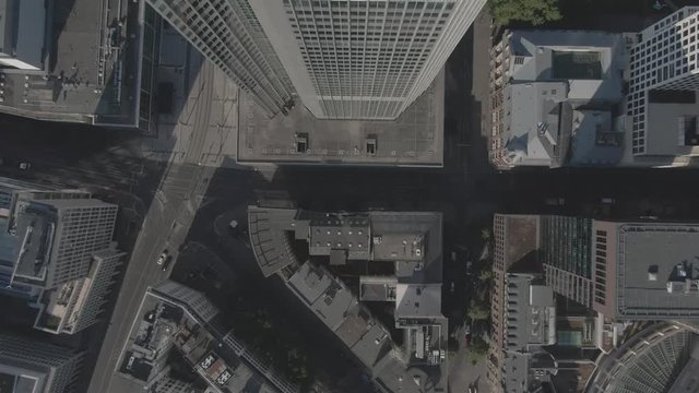 Aerial drone top shot of a Skyscraper within the Frankfurt am Main Skyline in Mainhattan
