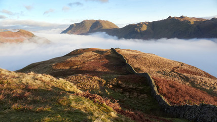 Cloud inversion over Patterdale with Arnison Crag to the left, Place Fell and on the right from Hartsop Above How in the Lake District.